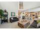 Spacious living room with a cozy seating arrangement and open layout at 10572 Jaguar Gln, Lone Tree, CO 80124
