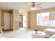 Living room with view of the front door and entryway, with modern decor at 654 S Xenon Ct, Lakewood, CO 80228