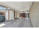 Covered carport area featuring a storage shed and access to the backyard at 1164 W 101St Pl, Northglenn, CO 80260