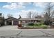 Inviting single-story home with a well-maintained lawn and established landscaping at 1164 W 101St Pl, Northglenn, CO 80260