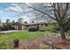 Well-manicured front yard with mature landscaping and a charming brick home at 1164 W 101St Pl, Northglenn, CO 80260
