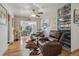 Cozy sitting area with hardwood floors, comfortable recliners, and decorative accents, creating a relaxing retreat at 1164 W 101St Pl, Northglenn, CO 80260