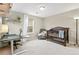 Neutral Bedroom room with crib, desk, and large window for lots of natural light at 2184 Willow Ct, Denver, CO 80238