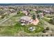 Serene aerial view of a large, well-kept home with an expansive lawn, providing an inviting view of a neighborhood at 6411 Sand Rose Ct, Castle Rock, CO 80108
