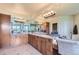 Large bathroom with double vanities, granite countertop, and ample cabinet space at 6411 Sand Rose Ct, Castle Rock, CO 80108