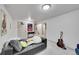 Finished basement offering a cozy seating area, providing additional living space in the home at 6368 S Harlan Way, Littleton, CO 80123