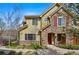 Charming home with a stone and siding exterior, manicured landscaping, and a welcoming front entrance at 10103 Bluffmont Ln, Lone Tree, CO 80124