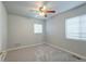Bedroom featuring neutral paint, carpeting and window at 3355 Willowrun Dr, Castle Rock, CO 80109