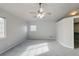 Large bedroom offers neutral paint, ceiling fan and natural light at 3355 Willowrun Dr, Castle Rock, CO 80109