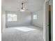 Bright and spacious bedroom with neutral paint, ceiling fan and lots of natural light at 3355 Willowrun Dr, Castle Rock, CO 80109