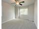 Large bedroom offers neutral paint, ceiling fan and a lot of natural light at 3355 Willowrun Dr, Castle Rock, CO 80109