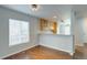 Bright dining area with hardwood floors, large windows, and an elegant chandelier at 3355 Willowrun Dr, Castle Rock, CO 80109