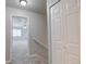 Hallway view showcases neutral colors and plush carpeting to the main living area at 3355 Willowrun Dr, Castle Rock, CO 80109