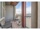 Inviting balcony with outdoor seating offers a pleasant space to unwind and enjoy the view at 7010 W Alaska Dr, Lakewood, CO 80226