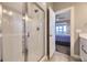 Bathroom with modern tile shower and glass door featuring modern fixtures and finishes at 7010 W Alaska Dr, Lakewood, CO 80226