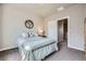 Cozy bedroom with carpeted floors and an inviting space to relax and unwind at 7010 W Alaska Dr, Lakewood, CO 80226