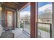 Inviting front porch of a modern townhome, perfect for relaxing and enjoying the vibrant neighborhood at 7010 W Alaska Dr, Lakewood, CO 80226