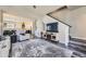 Inviting living room with open layout to the kitchen, ideal for entertaining guests at 7010 W Alaska Dr, Lakewood, CO 80226
