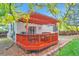 Relaxing backyard deck under a pergola, perfect for outdoor dining and entertaining at 18619 E Vassar Dr, Aurora, CO 80013