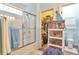Bathroom featuring shower, tub and walk in closet at 18619 E Vassar Dr, Aurora, CO 80013