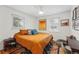 Cozy bedroom with a large window, ceiling fan, and a comfortable-looking rug at 6755 W 33Rd Ave, Wheat Ridge, CO 80033