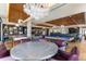 A luxurious game room features a billiard table, foosball table, and comfortable seating at 1750 Wewatta St # 805, Denver, CO 80202