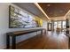Inviting community game room with modern decor, a bar, and a shuffleboard table at 1750 Wewatta St # 805, Denver, CO 80202