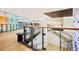 Bright lobby featuring hardwood floors, contemporary design, and elegant glass railings at 1750 Wewatta St # 805, Denver, CO 80202
