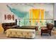 A cozy resident lounge with plush seating and unique artwork provides a relaxing atmosphere at 1750 Wewatta St # 805, Denver, CO 80202