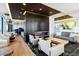 Upscale lounge area featuring stylish seating, hardwood floors, and a modern fireplace at 1750 Wewatta St # 805, Denver, CO 80202