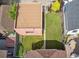 An aerial view of a backyard featuring green grass and a walkway at 869 S Williams St, Denver, CO 80209