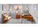 Bedroom with natural light, desk, chair, side table and neutral carpeting at 6802 Poppy Ct, Arvada, CO 80007