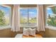 Scenic view from the interior, showcasing a well-maintained landscape and serene surroundings at 6802 Poppy Ct, Arvada, CO 80007
