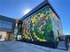 Unique building featuring an enormous mural covering the entire wall at 888 S Valentia St # 104, Denver, CO 80247