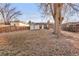 Great backyard with mature trees offering plenty of shade at 6167 Newland St, Arvada, CO 80003