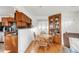 Dining area with hardwood floors and open access to the kitchen at 6167 Newland St, Arvada, CO 80003