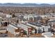 Urban neighborhood view highlighting modern townhomes with rooftop patios and neighborhood features at 1836 Grove St # 105, Denver, CO 80204