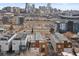 Aerial view showcasing the property, city skyline, and surrounding neighborhood at 1836 Grove St # 105, Denver, CO 80204
