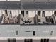 Aerial view of rooftop patios and the community, showcasing outdoor living spaces at 1836 Grove St # 105, Denver, CO 80204