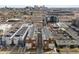 Aerial view of the property with a city skyline and a stadium at 1836 Grove St # 105, Denver, CO 80204