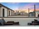 City skyline view from the rooftop deck, perfect for relaxation and entertainment at 1836 Grove St # 105, Denver, CO 80204