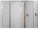 Tiled shower with a rainfall shower head and modern fixtures at 1836 Grove St # 105, Denver, CO 80204