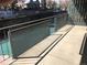 Spacious patio with a metal railing, offering an inviting outdoor living area at 200 N Pearl St # 205, Denver, CO 80203