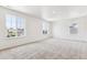 Spacious bedroom with plush carpeting, bright windows, and ample natural light at 1038 Scotts Peak Dr, Berthoud, CO 80513