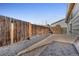 Gravel backyard with wooden fence at 2017 Tulane St, Denver, CO 80260