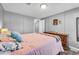 Well-lit bedroom with hardwood floors and dresser at 2017 Tulane St, Denver, CO 80260