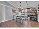 Dining area with table and bench seating, near the kitchen at 2017 Tulane St, Denver, CO 80260