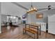 Open concept dining area with kitchen and living room views at 2017 Tulane St, Denver, CO 80260