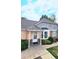 A cozy townhome with a well-kept front yard and inviting entrance at 1748 Eagle St # B, Aurora, CO 80011