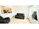 Bright living room with tile flooring, offering versatile living space at 1748 Eagle St # B, Aurora, CO 80011